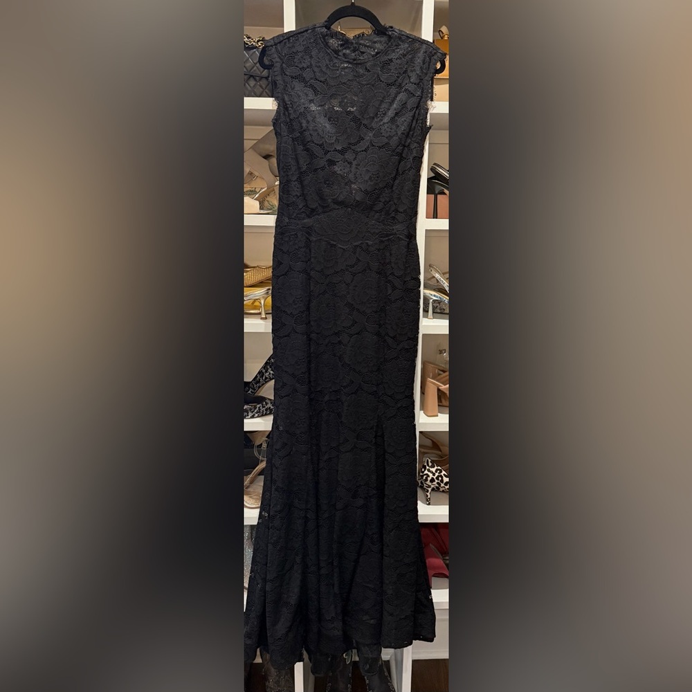 Elegant Black Lace Betsy Adam’s gown.